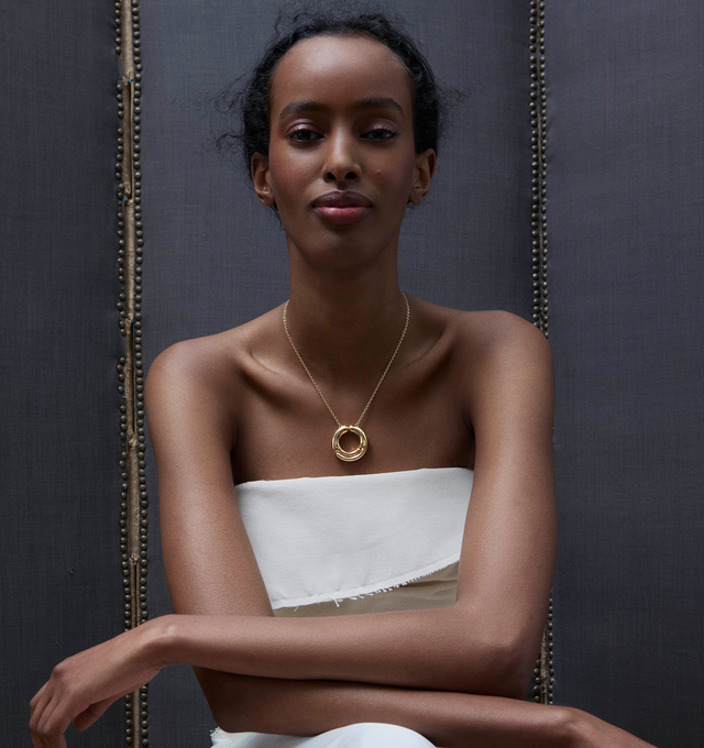 Image 2 of 3 - GOLD - Pamela Zamore Holos Circle Necklace featuring two sculptural halves of a piece interlocking to become one. Hand-finished. 18K yellow gold, 30g. Pendant diameter 35mm. Length: 18/20. Hirshleifers offers a range of pieces from this collection in-store. For personal consultation and detailed information about jewelry, please contact our dedicated stylist team at personalshopping@hirshleifers.com. This item may be restricted for online purchase to international clients. For assistance purc 