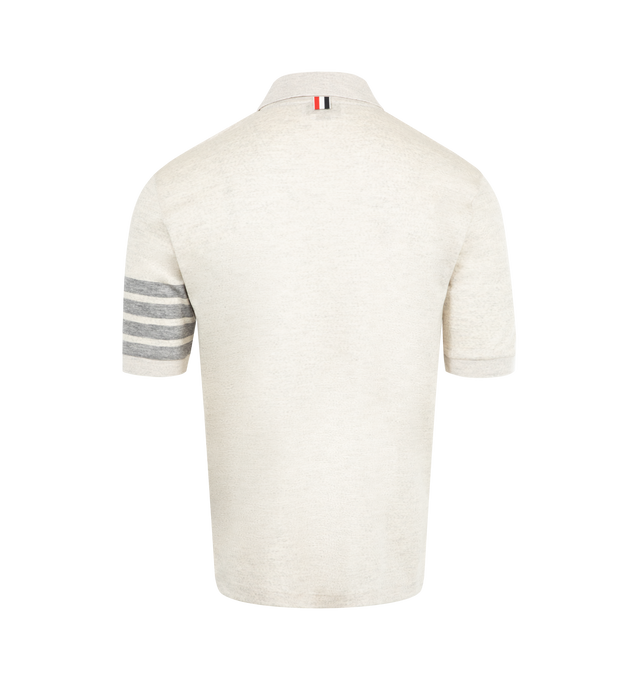 Image 2 of 3 - WHITE - THOM BROWNE Wool Jersey 4-Bar Polo featuring partial front button closure, 4-bar detailing, name tag applique, buttoned side vents with signature striped grosgrain trim and signature striped grosgrain loop tab. 100% virgin wool. Made in Italy. 
