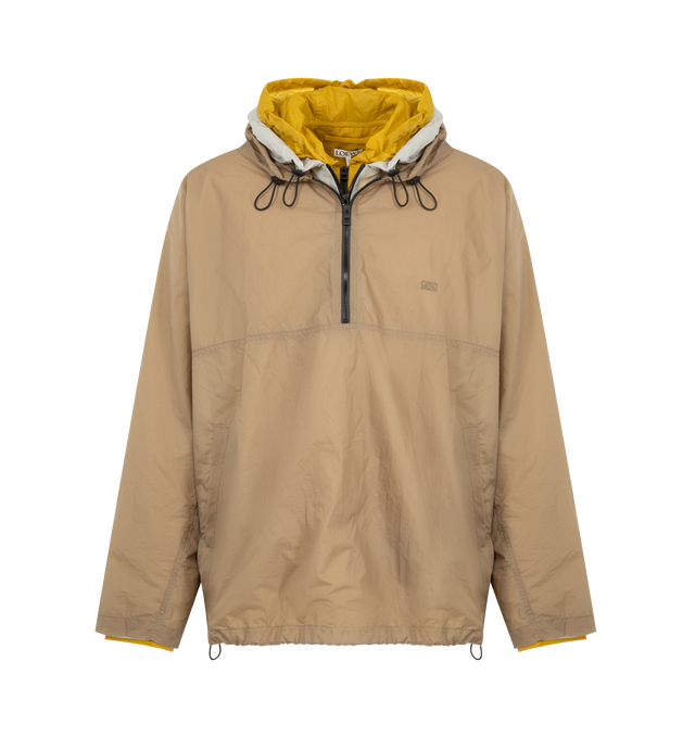 Image 1 of 3 - NEUTRAL - Loewe Mens Technical Shell Anorak is crafted from lightweight technical shell with a triple-layer construction. Features a relaxed fit, regular length, zip-up neckline with hood, front welt pockets, elasticated hem with drawstring, and Double L embroidery at the chest. Main Material: Polyamide / Polyurethane. Made in Italy. 