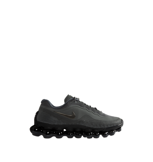 Image 1 of 5 - GREY - Nike Air Liquid Max Sneakers feature a textured upper with a low-cut silhouette for modern style and lasting comfort. These performance-inspired lifestyle sneakers combine a drop-in Cushlon midsole with a full-length point-loaded Max Air cushioning system for exceptional responsiveness, lightweight support, and all-day comfort. Main Material: Textile and Synthetic. Midsole: Cushlon with Max Air Cushioning. Sole: Rubber. 