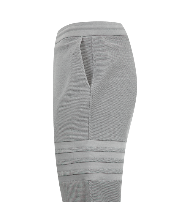 Image 3 of 4 - GREY - Loopback 4 Bar Sweatpants featuring iconic 4-Bar detailing, drawstring waistband with silver tone aglets, name tag applique, slip side pockets and signature striped grosgrain loop tab. 100% cotton. Made in Italy. 