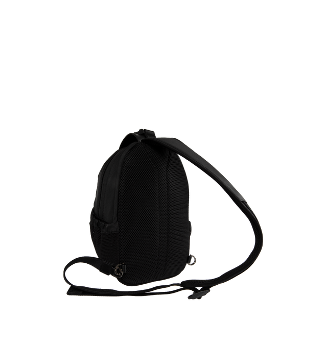 Image 2 of 3 - BLACK - GIVENCHY G-Trail Sling Bag featuring zipped closure, one adjustable padded Givenchy webbing strap to wear on the chest or as a small backpack, padded back for comfort, webbing strap on the front with reflective GIVENCHY signature and 4G buckle clip closure, decorative scratch on the front with Giv Cut signature and metal D-Ring, black and silvery-finish metal details, one main large compartment and two bottle compartments in mesh with drawstring on the sides. 7.87 in x 11.02 in x 3.54 