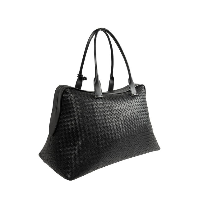 Image 2 of 3 - BLACK - BOTTEGA VENETA Vaporetto Small Weekender Bag featuring supple Intrecciato craftsmanship in nappa leather, a detachable coaxial leather lanyard with functional lock, one main compartment with one zipped pocket and three flat open pockets and lock-secured zipper closure. 13" x 20.1" x 9.8". Lambskin. Lining: nylon. Made in Italy. 