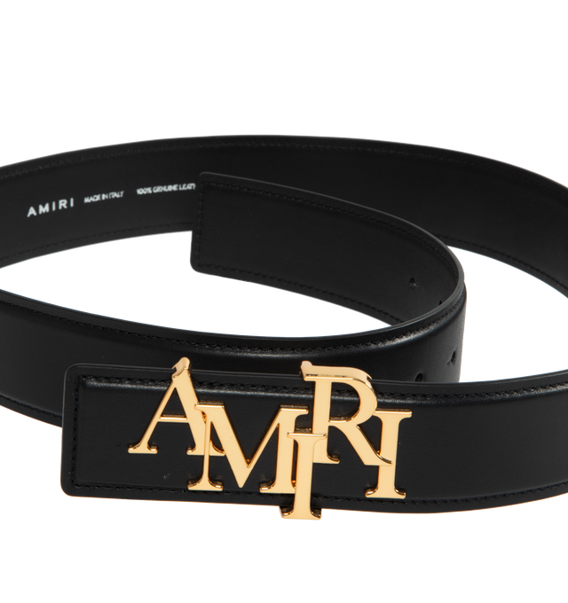 BLACK - AMIRI 4CM AMIRI STAGGERED BELT has a pushpin closure and gold-tone Amiri logo at buckle. 100% genuine leather.