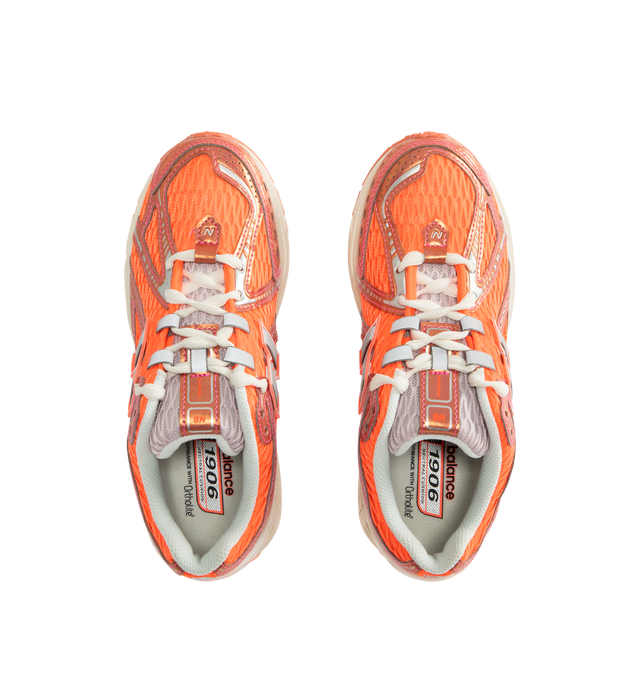 Image 5 of 5 - ORANGE - NEW BALANCE 1906R Sneakers featuring mesh upper with synthetic overlays, ACTEVA LITE midsole cushioning, ABZORB SBS heel cushioning, N-ergy outsole provides superior shock absorption, Stability Web outsole technology provides added arch support, TPU heel cage, rubber sole and adjustable lace closure. 