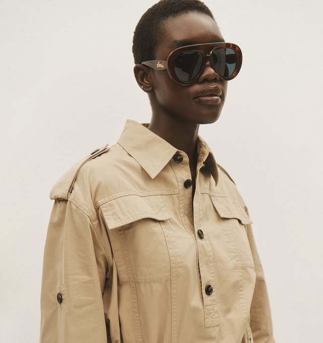 Image 4 of 5 - BROWN - LOEWE Curvy Pilot Acetate Sunglasses featuring bomb acetate, curvy logo on the temples, solid lenses, saddle nose bridge and tapered arms. Acetate. 100% UVA/UVB protection. 