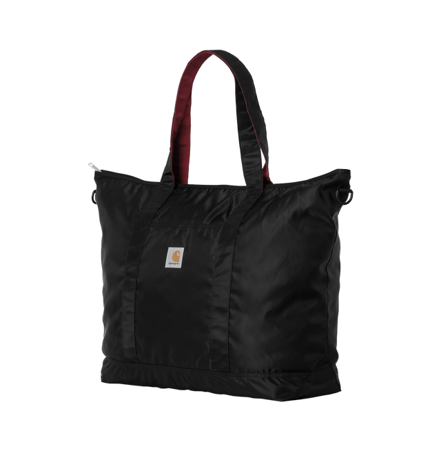 Image 3 of 4 - BLACK - CARHARTT WIP Alumni Tote Bag featuring quilted contrasting lining, top zip fastening, double handles and external pocket. 17.7 x 25.5 x 7 inch. 100% nylon. 