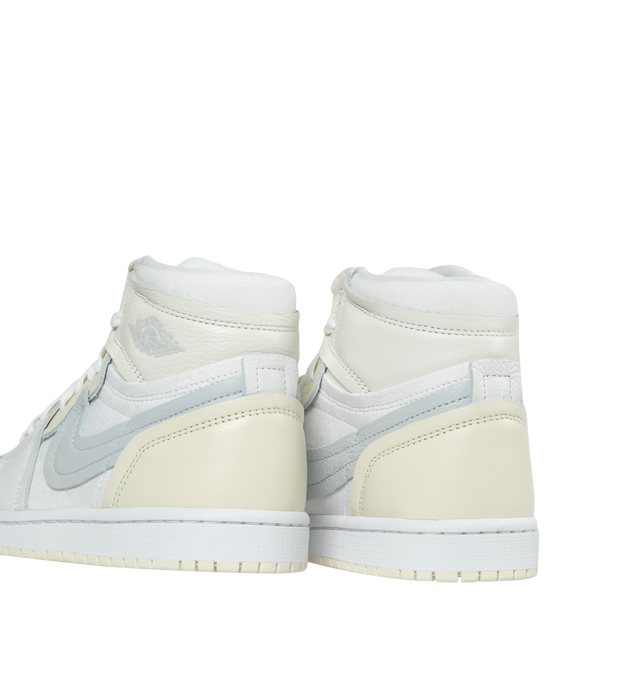 WHITE - JORDAN Air Jordan 1 High Method of Make featuring soft-touch textiles, unlined, deconstructed toe box, exaggerated overlays, deconstructed design elements and a larger Swoosh.