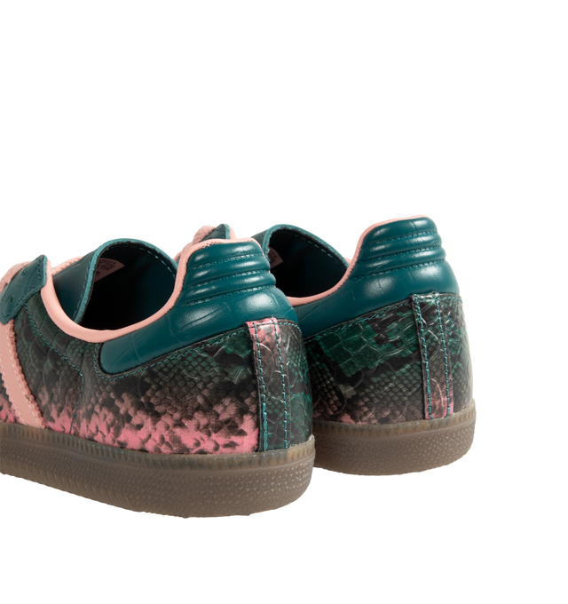 Image 3 of 5 - GREEN - Adidas Women's Samba OG Shoes reinterpret the brands iconic soccer-inspired silhouette with premium leather construction and heritage detailing. Designed with a lace-up closure and the signature elongated tongue, this updated version pairs classic Samba styling with modern versatility. Metallic Samba branding and Trefoil detailing celebrate the legacy of adidas Originals, while the durable rubber outsole provides reliable traction for everyday wear. Main Material: Leather. Closure: La 