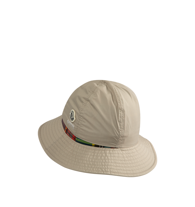 Image 2 of 2 - NEUTRAL - Moncler x FRGMT by Hiroshi Fujiwara collection- Reversible Bucket Hat featuring 2L ripstop, nylon lining, reversible, GORE-TEX Infinium membrane, printed logo details and logo patch. 100% polyamide/nylon. 100% polyester. 