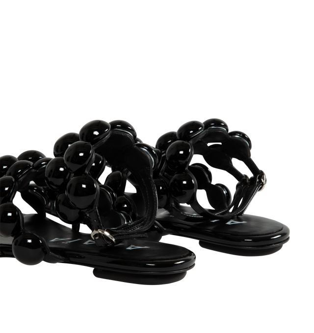 Image 3 of 4 - BLACK - ALAIA Flat Sphere Sandals featuring straps adorned with leather covered half-spheres and buckle closure. 100% lambskin. 