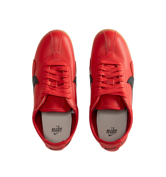 Image 5 of 5 - RED - Nike Women's Moon Shoe Sneakers are designed with a premium full-grain leather upper and the brand's iconic Waffle outsole, this heritage-inspired style captures the look and feel of a classic 1970s runner while delivering everyday comfort and durability. Main Material: Full-Grain Leather Upper. Outsole: Rubber Waffle Sole. 