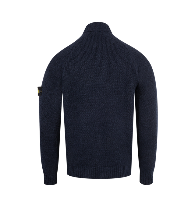 Image 2 of 3 - NAVY - STONE ISLAND Wool Cardigan featuring knit virgin wool-blend, rib-knit stand collar, hem, and cuffs, two-way zip closure, patch pockets at waist, raglan sleeves and detachable felted logo patch at sleeve. 48% virgin wool, 43% polyamide, 9% viscose.  