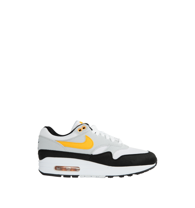 WHITE - NIKE Air Max 1 featuring premium upper, low-cut collar, full-length Polyurethane (PU) midsole, visible Max Air heel unit and solid rubber waffle outsole.