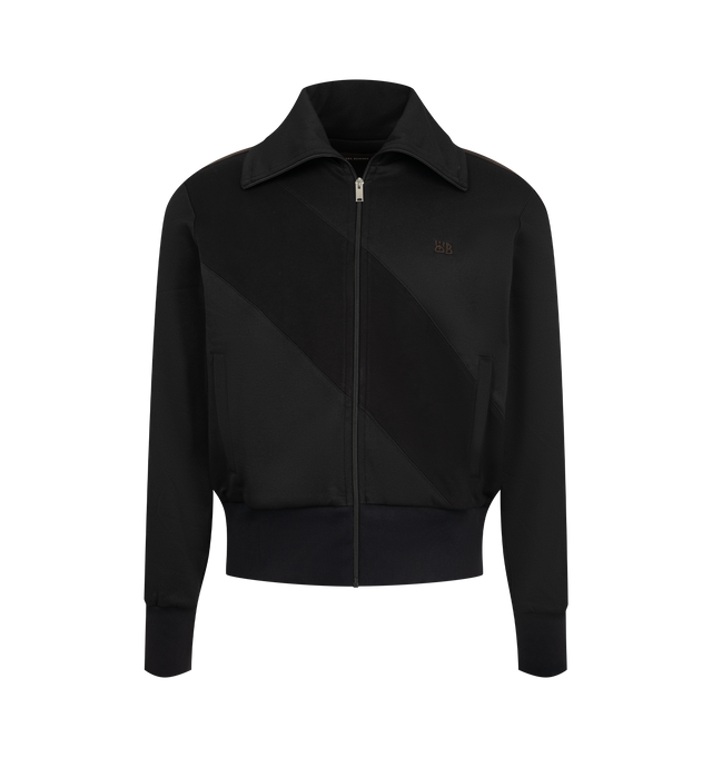 Image 1 of 3 - BLACK - Wales Bonner Men's Form Track Jacket features a streamlined sportswear-inspired silhouette with a piqu texture, front zip fastening, long sleeves, pointed collar, elasticated cuffs, and an elasticated hem. Composition: Outer: Polyester 56%, Cotton 39%, Elastane 5%; Lining: Organic Cotton 100%. Made in Portugal. 