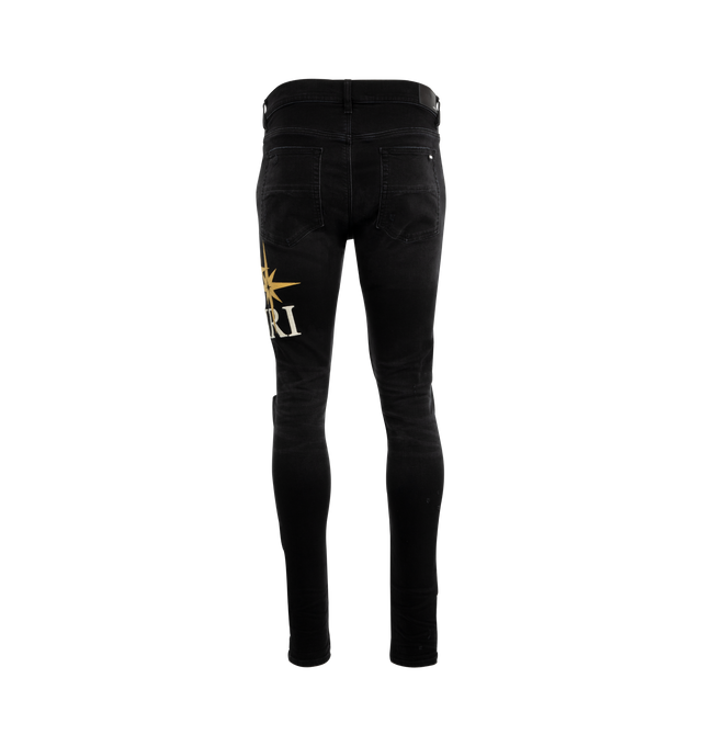 Image 2 of 3 - BLACK - Amiri Starburst Applique Skinny Jeans are a 5-pocket style with a button and zip fly, distressing, signatStarburst Applique Skinny Jeans (Mens) ure brand logo appliques on the left leg, and a regular rise. Cotton, polyester, elastane. Made in USA.  