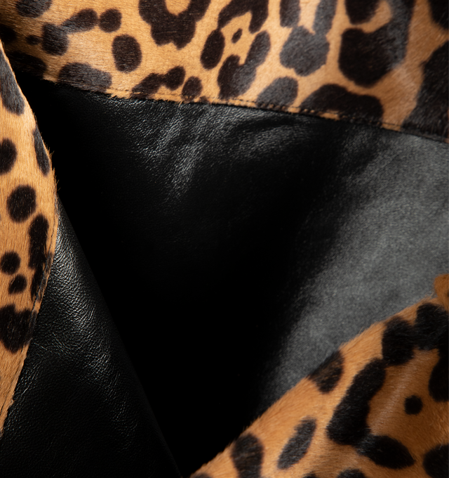 Image 3 of 3 - MULTI - Saint Laurent Women's Leopard-Print Shoulder Bag is crafted from leopard-print pony hair calfskin leather and features a woven jewelry chain shoulder strap for a bold, statement-making look. This designer shoulder bag combines luxurious Italian craftsmanship with a spacious silhouette, making it ideal for carrying everyday essentials in elevated style. Main Material: Calfskin Leather. Lining: Lambskin Leather. Hardware: Bronze-Tone Brass. Dimensions: 35 x 41 x 34 cm (13.8 x 16.1 x 1.2 