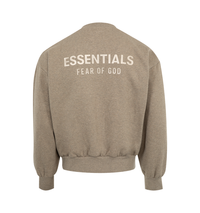 Image 2 of 2 - BROWN - FEAR OF GOD ESSENTIALS Classic Fleece Crewneck featuring 380gsm core fleece, classic fit with signature Fear of God relaxed proportions, new "Essentials Fear of God" beveled metallic logo is branded across the back, rib-knit collar, cuffs, and waist-hem and rubberized label is stitched on the sleeve. 80% cotton, 20% polyester fleece. 