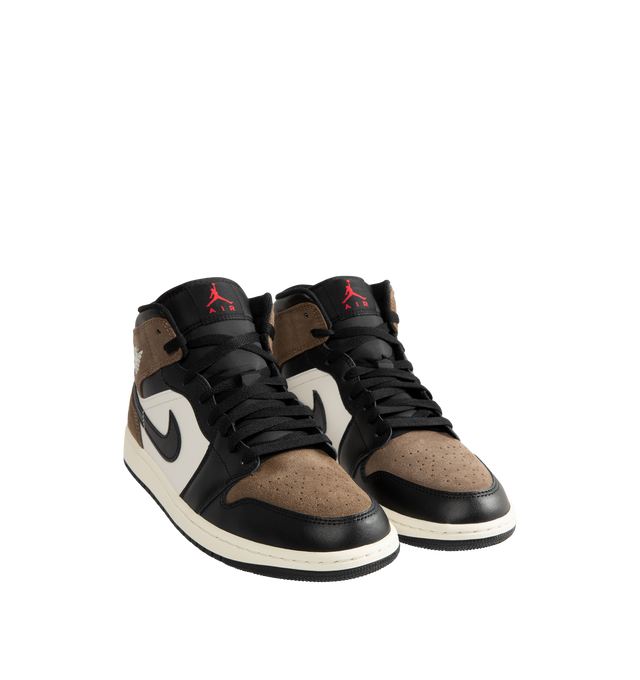 Image 2 of 5 - MULTI - Men's Air Jordan 1 Mid Sneakers feature a smooth leather upper with the iconic mid-top silhouette, breathable perforated toe box, and a padded collar for a timeless heritage look. These lifestyle sneakers combine a foam midsole with encapsulated Air-Sole cushioning and a durable rubber outsole with concentric traction for lightweight comfort, lasting support, and reliable everyday grip. Main Material: Leather. Midsole: Foam with Encapsulated Air-Sole Unit. Sole: Rubber.  