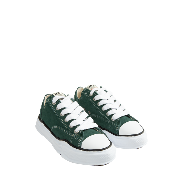 Image 2 of 5 - GREEN - Maison Mihara Yasuhiro Peterson Original Sole Suede Low-Top Sneakers are crafted from cow leather and feature the brand's signature hand-sculpted original sole, modeled in clay by designer Mihara. Designed with the classic Peterson silhouette, this low-top sneaker combines a premium leather upper with the label's distinctive artisanal sole construction. Main Material: Upper: Suede Leather. Sole: Rubber. 