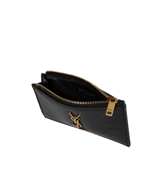 Image 3 of 3 - BLACK - SAINT LAURENT Zipped Fragments Credit Card Case featuring grained leather exterior with leather lining, top zipper closure, one main compartment, 5 card slots at back and aged gold-tone cassandre hardware at front. 5" W x 3" H x 0.25" D. 100% leather.  