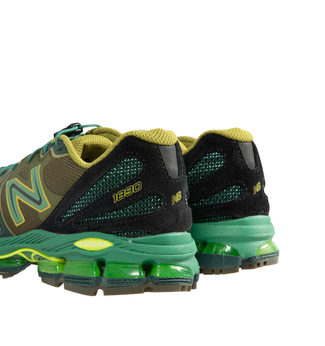 Image 3 of 5 - GREEN - New Balance 1890 Mens Sneakers feature a synthetic upper with a classic lace-up silhouette. Designed with ABZORB midsole cushioning for enhanced impact absorption, all-day comfort, and a durable rubber outsole. Upper: Synthetic; Midsole: ABZORB. Made in Vietnam. 