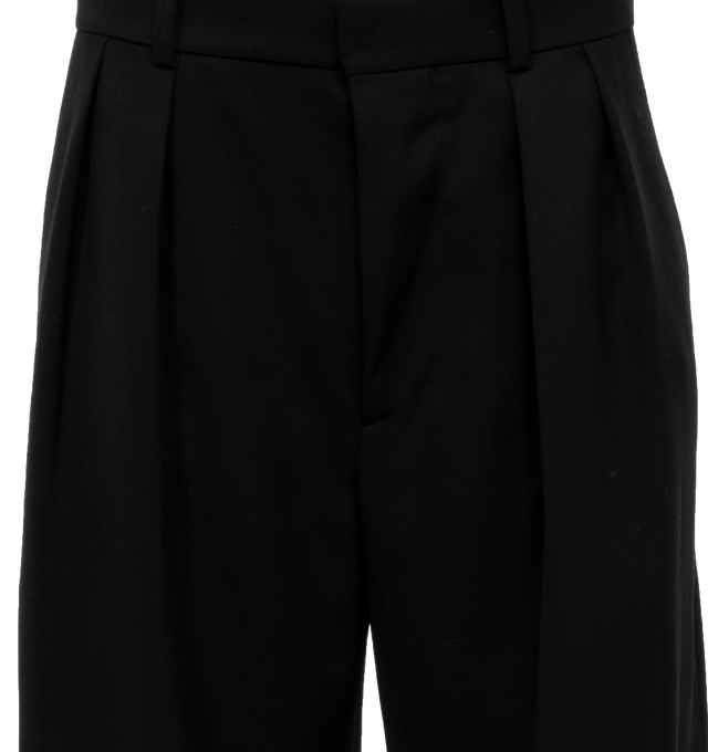Image 4 of 4 - BLACK - WARDROBE.NYC Low Rise Trousers featuring pleated waist, hook-and-eye closures at waist, zip fly, wide-leg silhouette, slant hip pockets and faux welt back pockets. 100% wool. 