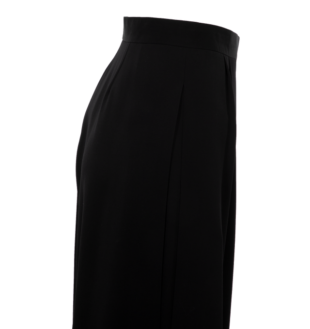 Image 3 of 4 - BLACK - THE ROW Paras Pant featuring a mid-rise tailored pant in fine wool gabardine with wide leg, voluminous side pleats, and side seam pockets. 100% wool. Silk lining. Made in Italy. 