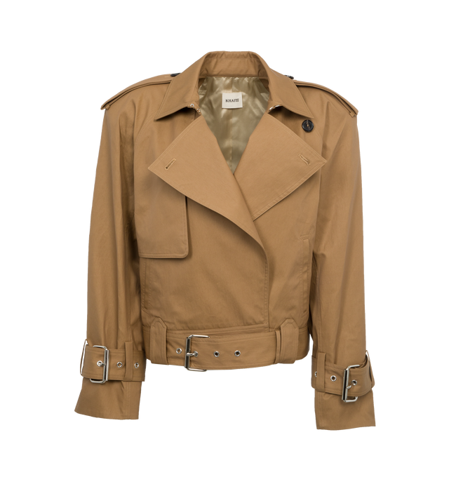 Image 1 of 4 - BROWN - KHAITE Hammond Jacket featuring cropped fit, moto accents, oversized fit, belted hem and cuffs with chrome buckles and classic trench details. 69% cotton, 31% polyamide. 