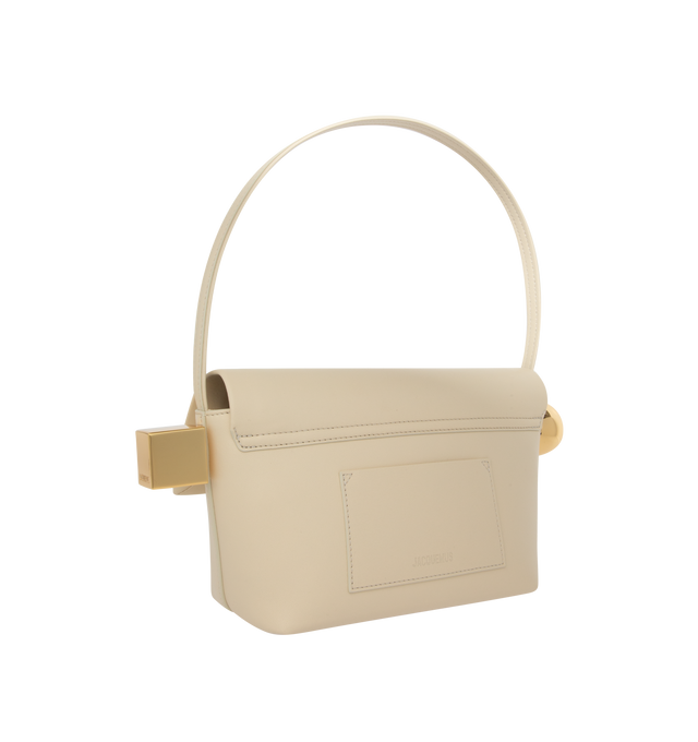 Image 2 of 3 - NEUTRAL - Jacquemus Le Rond Carre Shoulder Bag has a magnetic foldover flap, logo hardware, and an interior card slot. 100% calf leather. Made in Italy.  