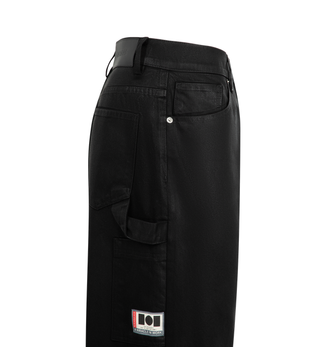 Image 3 of 3 - BLACK - NAHMIAS Waxed Denim Baggy Jeans featuring hammer loop, logo patch, waxed exterior finishing, button zip closure and 5 pocket style. 100% cotton. 