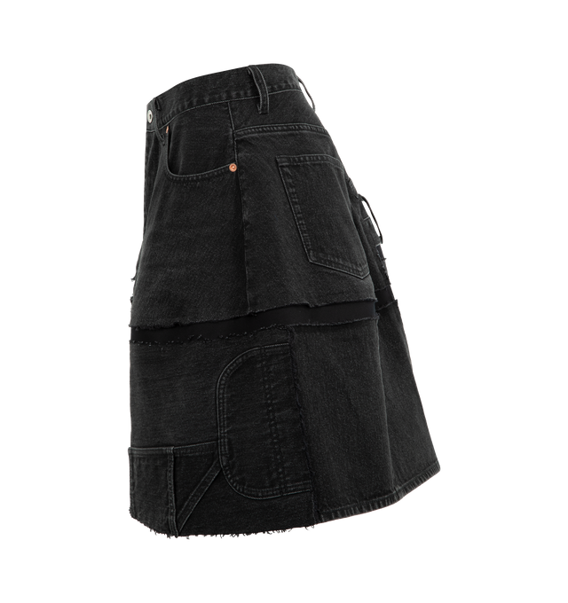 Image 3 of 3 - BLACK - SACAI Denim Skirt featuring mini length, raw hem, patchwork design, button zip closure and belt loops. 100% cotton.  