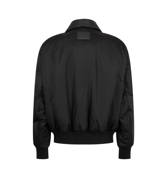 Image 2 of 3 - BLACK - Balenciaga Men's Cocoon Bomber Jacket is crafted from black cotton-blend twill and features a calfskin collar, dropped shoulders, and a single-zip closure. Two slash pockets and ribbed cuffs and hem complete the design. Main Material: 80% Cotton, 16% Polyamide, 4% Elastane. Lining: 100% Polyester. Filling: 100% Polyester. Embroidery: 100% Polyester. Leather Detail: Calfskin. Made in Italy. 