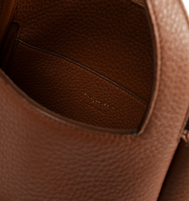 Image 3 of 3 - BROWN - Saint Laurent Women's LE 5  7 Baby Bea Bag is crafted from grained deerskin leather and features a compact version of the house's iconic LE 5  7 Bea silhouette. Designed with a signature YSL 'CASSANDRE' hook closure, top handle, and an adjustable, detachable crossbody strap, this versatile style can be carried by hand or worn crossbody. The interior is lined in tonal suede and finished with bronze-tone brass hardware. Main Material: Deerskin Leather. Lining: Suede. Hardware: Bronze-To 