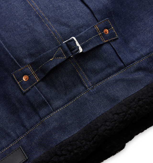 Image 6 of 6 - BLUE - Sacai X Levi's Women's Denim Jacket are crafted from a premium dark wash rigid indigo denim paired with contrasting plush black faux-shearling/sherpa accents at the collar, cuffs, and hem. Main Material: 100% Cotton. Made in Japan. 
