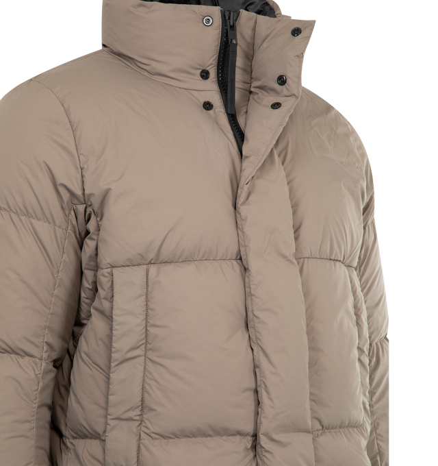 Image 4 of 4 - BROWN - CANADA GOOSE Everett Hooded Puffer featuring recessed rib-knit cuffs, placket overtop two-way zipper, hem with interior drawcord, two exterior pockets: fleece-lined handwarmer pockets with zipper closures and three interior pockets: two mesh drop-in pockets, one security pocket. 100% recycled nylon. 