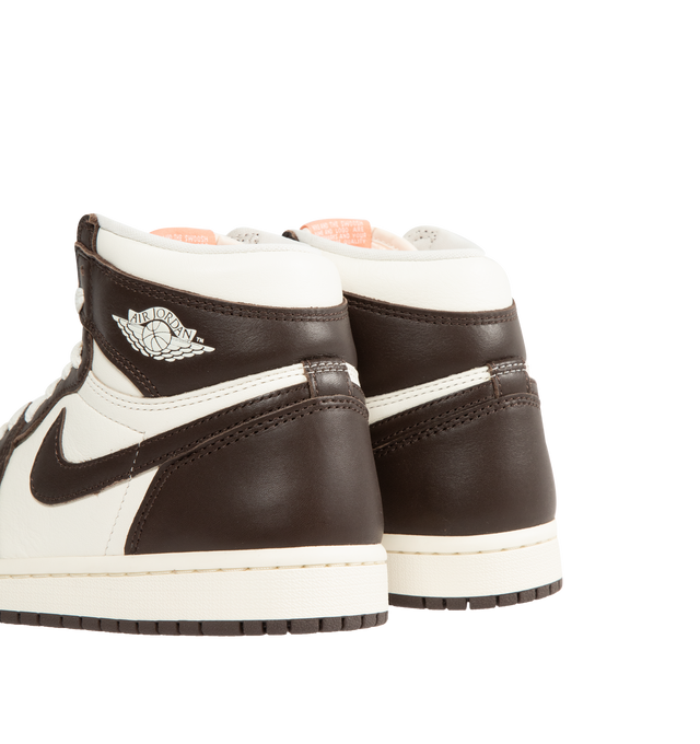 Image 3 of 5 - BROWN - JORDAN Air Jordan 1 Retro High OG Sneaker featuring soft cushioning, a padded ankle collar, premium construction, lace up closure and encapsulated Nike Air-Sole unit in the heel. 