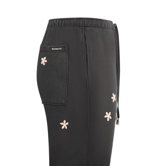 Image 3 of 4 - BLACK - NAHMIAS Flower Groms Sweatpants featuring a relaxed, wide-leg silhouette, embroidered flowers, drawstring waist, back patch pocket and pull on style. 100% cotton. Made in USA. 