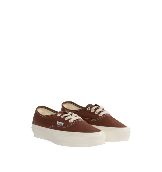 Image 2 of 5 - BROWN - VANS Authentic Reissue 44 LX Sneakers featuring low-top, lightweight canvas upper,  lace-up closure, logo flag at outer side, rubber logo patch at heel, textured rubber midsole, treaded rubber sole and contrast stitching in white. Upper: canvas. Sole: rubber.  