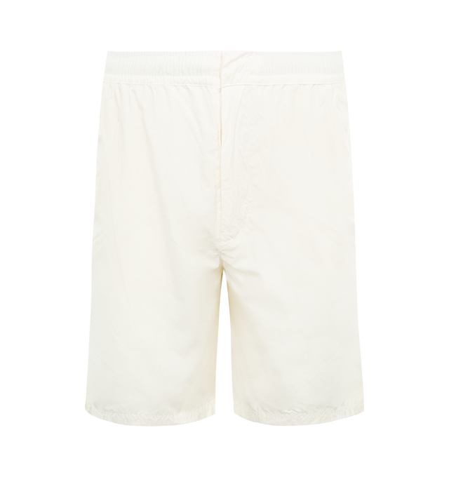 Image 1 of 3 - WHITE - STONE ISLAND Ghost Swim Shorts featuring comfort fit, slanted hand pockets, two back pockets with hidden zipper closure, tone-on-tone Stone Island lettering print on left leg, side vents on the bottom hems, inner mesh, elasticized waistband with inner drawstring and zipper and button fly closure. 100% polyamide/nylon. 