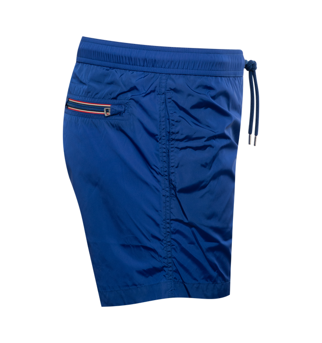 Image 3 of 3 - BLUE - MONCLER Swim Shorts featuring waistband with drawstring fastening, side pockets, zipped back pocket and silicone logo patch. 100% polyamide/nylon. 