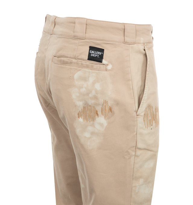 Image 3 of 3 - BROWN - GALLERY DEPT. Rico Chino Flare Pants featuring slim fit along the leg, mid-rise, flared hem, logo stamp above the right pocket, distressing throughout and chocolate chip camo print lining. 100% cotton twill. 