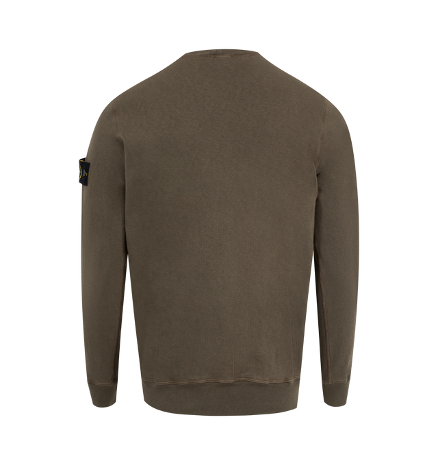 Image 2 of 3 - GREEN - Stone Island Sweatshirt has a ribbed neckline, overlock seams, Stone Island badge on the left sleeve, ribbed cuffs and bottom band and regular fit. 100% cotton.  