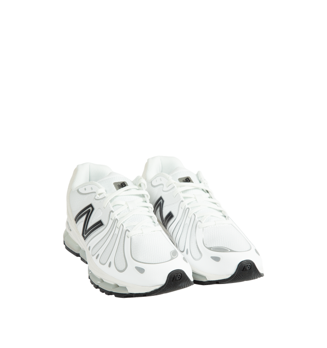 Image 2 of 5 - WHITE - New Balance 1890 Unisex Sneakers feature a synthetic upper with a classic lace-up silhouette. Designed with ABZORB midsole cushioning for enhanced impact absorption, all-day comfort, and a durable rubber outsole. Upper: Synthetic; Midsole: ABZORB. *Unisex style in men's sizing. 