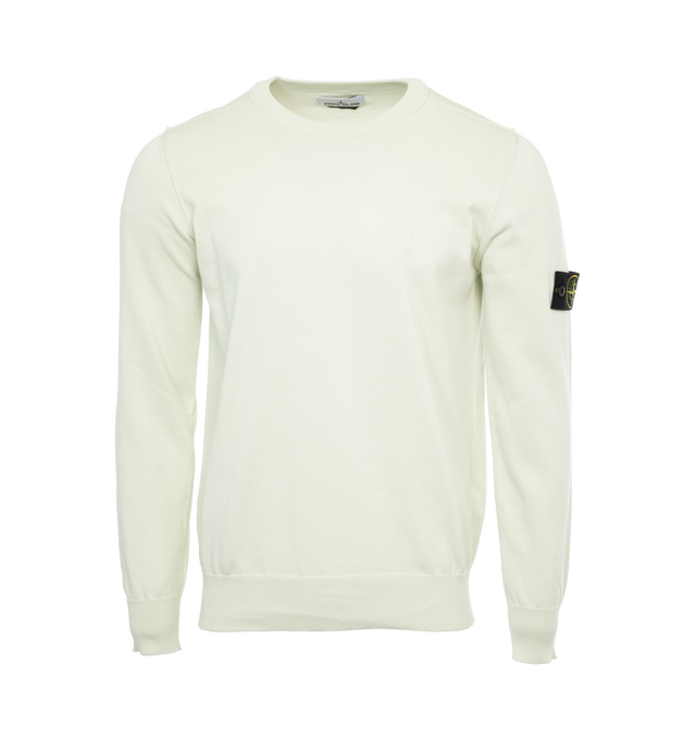WHITE - STONE ISLAND Long Sleeve T-Shirt featuring rib knit crewneck, cuffs, and hem, embroidered eyelet vents at armscyes and detachable felted logo patch at sleeve. 100% cotton. Made in Turkey.