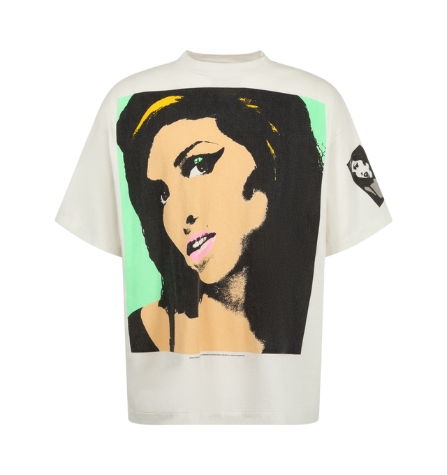 Image 1 of 3 - WHITE - Saint Michael Men's Amy Winehouse 'Back To Blk' T-Shirt features an iconic retro-style portrait of Amy Winehouse boldly printed on the front, while the brand logo and the name "AMY WINEHOUSE" are placed on the back. The cotton material is made to have a vintage-like expression unique to SAINT Mxxxxxx t-shirts. 