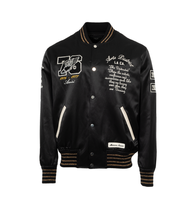Image 1 of 4 - BLACK - AMIRI Eagle Varsity Bomber Jacket featuring embroidered chest logo, front logo, logo at the back, logo at the back label, side pockets, button fastening, front buttoned closure, long-sleeved and embroidered details. 75% wool, 25% nylon. 
