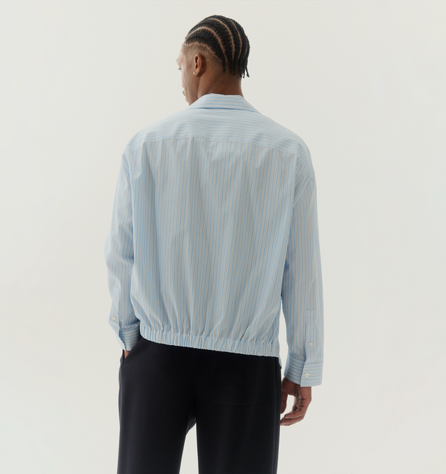 Image 3 of 5 - NAVY - LOEWE Trousers in medium-weight cavalry twill featuring pleats at the front, relaxed fit, regular length, mid waist, straight leg, concealed zip fly, buttoned coin pocket, seam pockets, rear patch pocket and LOEWE embossed leather patch placed at the front. Wool. Made in Italy. 