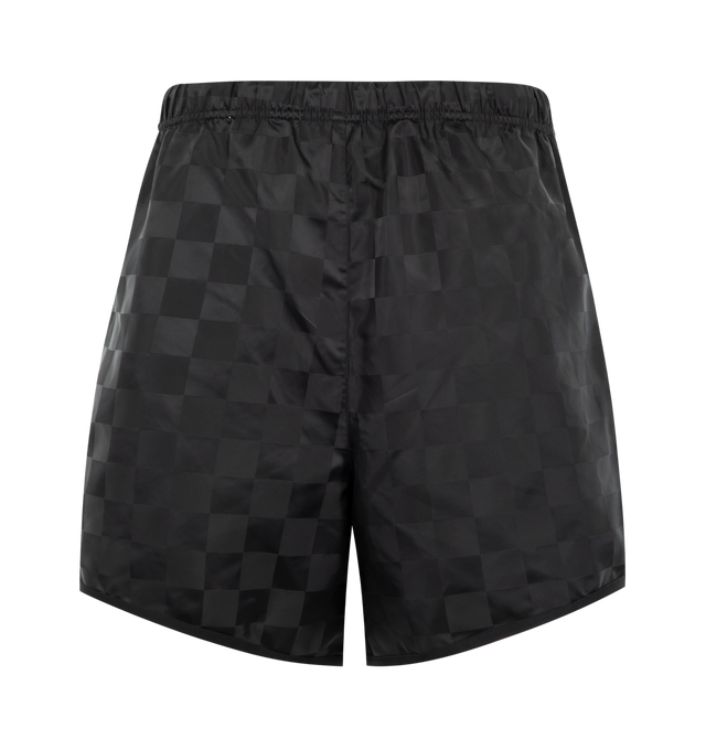 Image 2 of 3 - BLACK - Fear of God Essentials Mens Checkered Gym Shorts are crafted from nylon. Feature a relaxed fit, and an elasticized waistband with drawstring. Main Material: Nylon.  