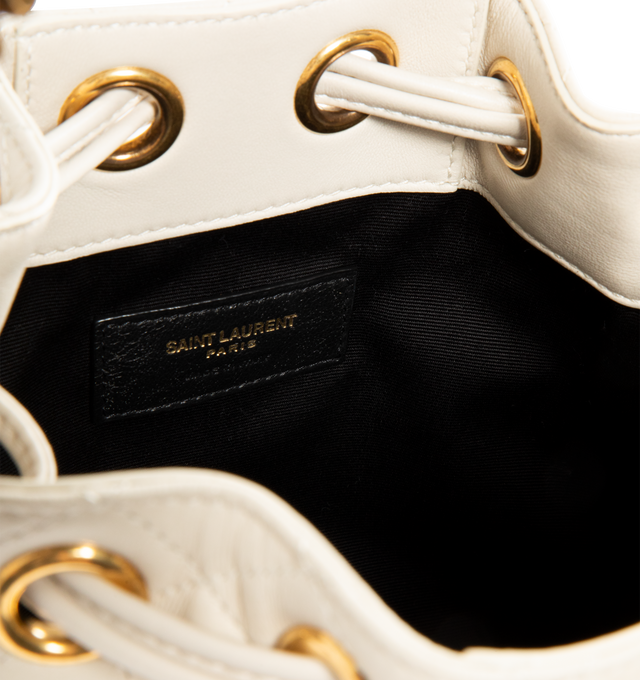 Image 3 of 3 - WHITE - SAINT LAURENT Chain Bucket Bag in quilted lambskin featuring a jewelry chain strap for shoulder carry, leather lining, bronze-tone hardware and drawstring closure. 6.3" x 7.1" x 3.9". Strap drop: 15.7". Lambskin. Made in Italy. 